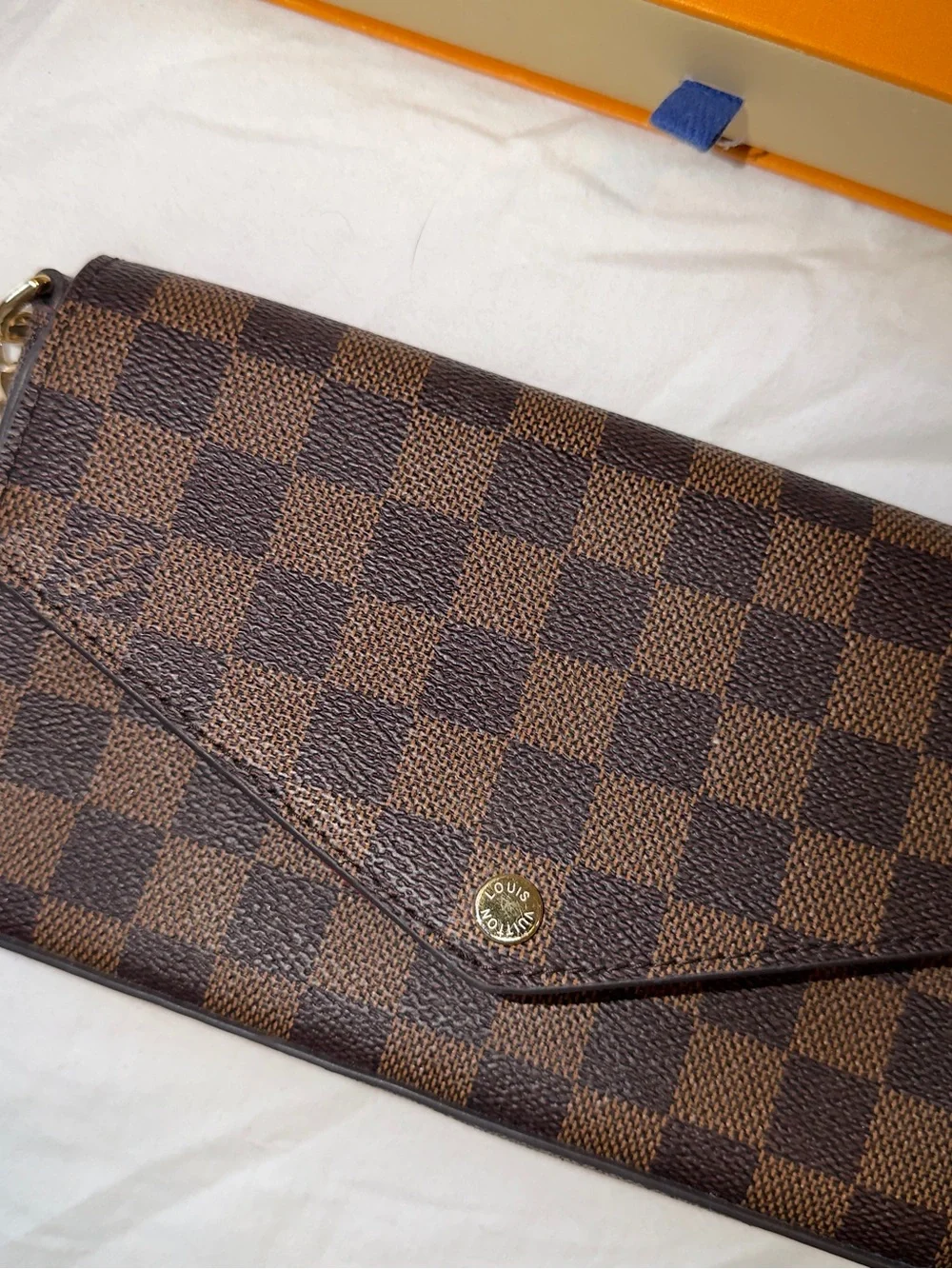Brown and black checkered wristlet /crossbody